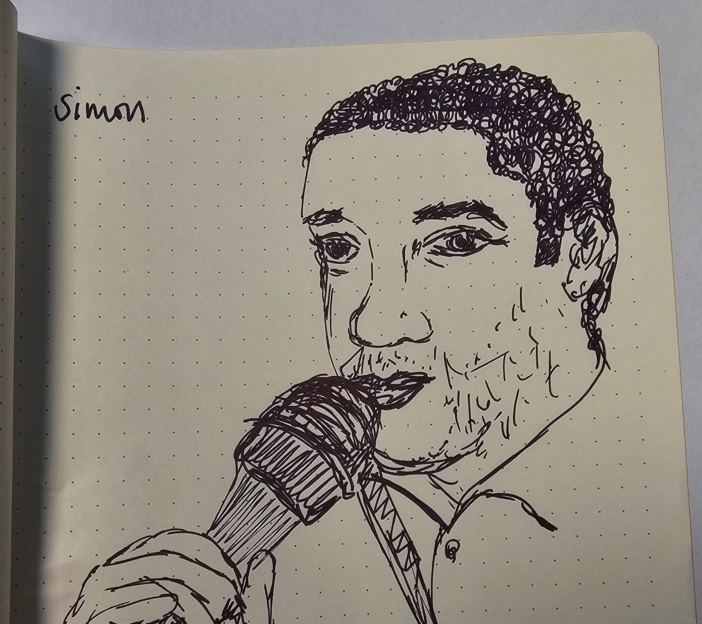 Sketch of Simon Usifo, a man with very short curly hair